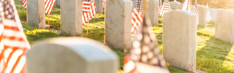 Tombstones in a military cemetery in the morning